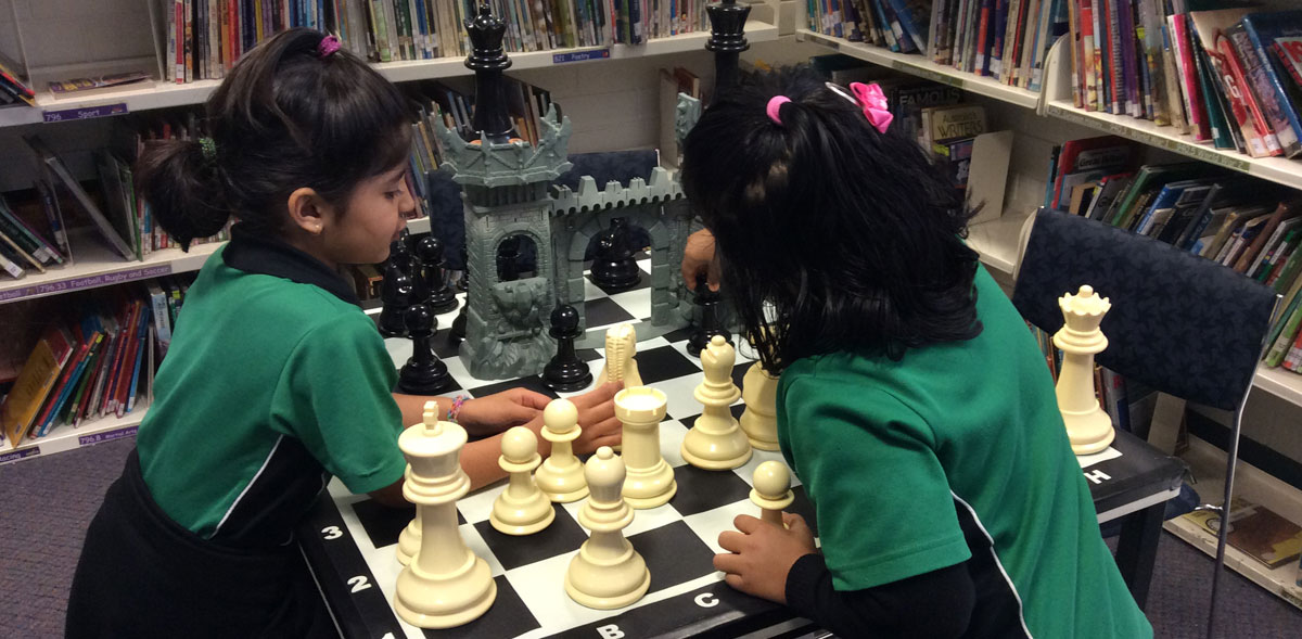 Students playing a board game