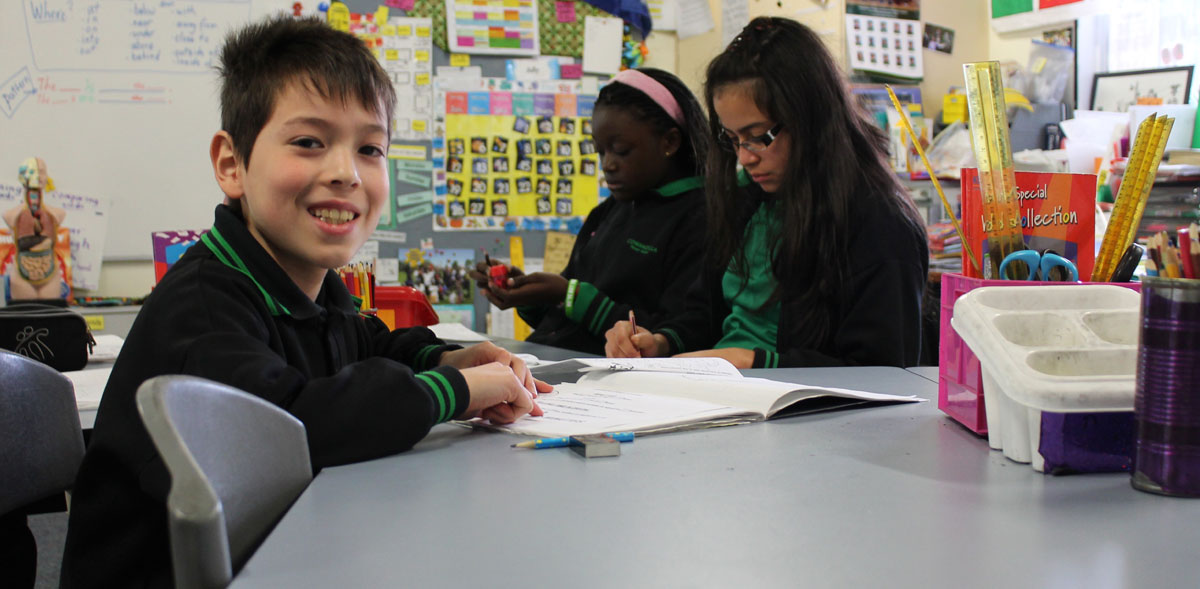 Students writing in class