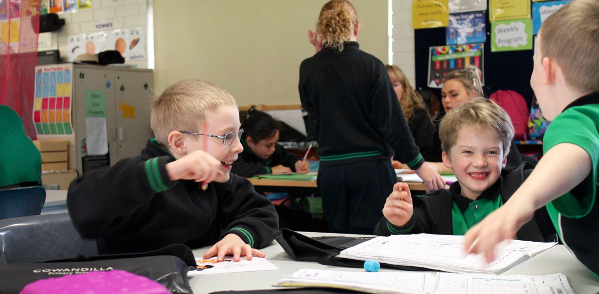 Students smiling in class