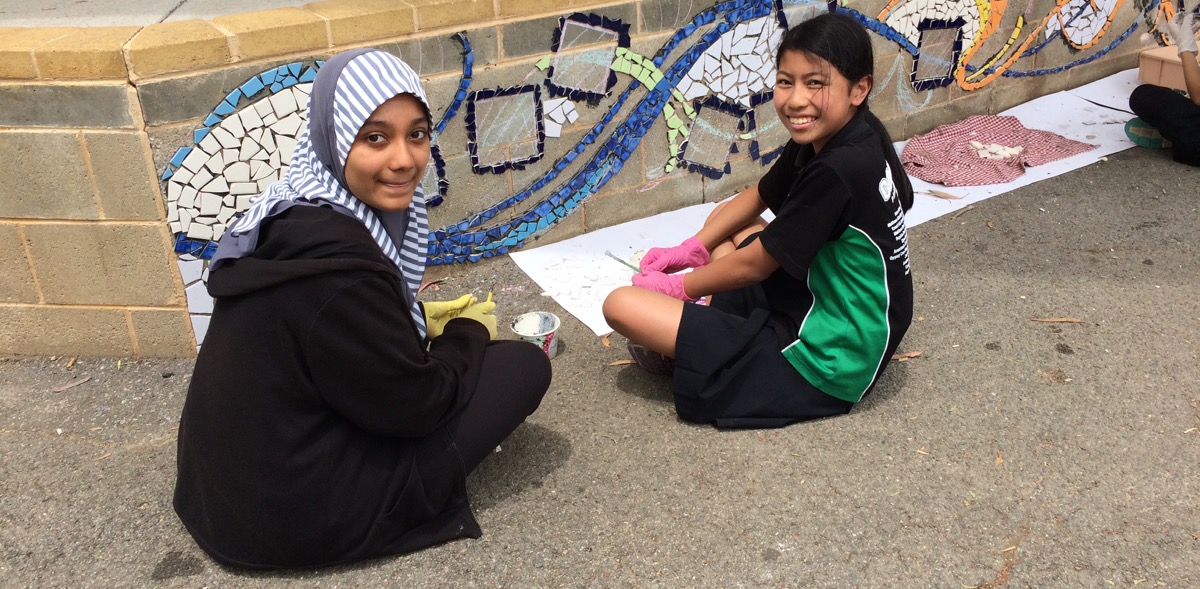 Students making mosaic